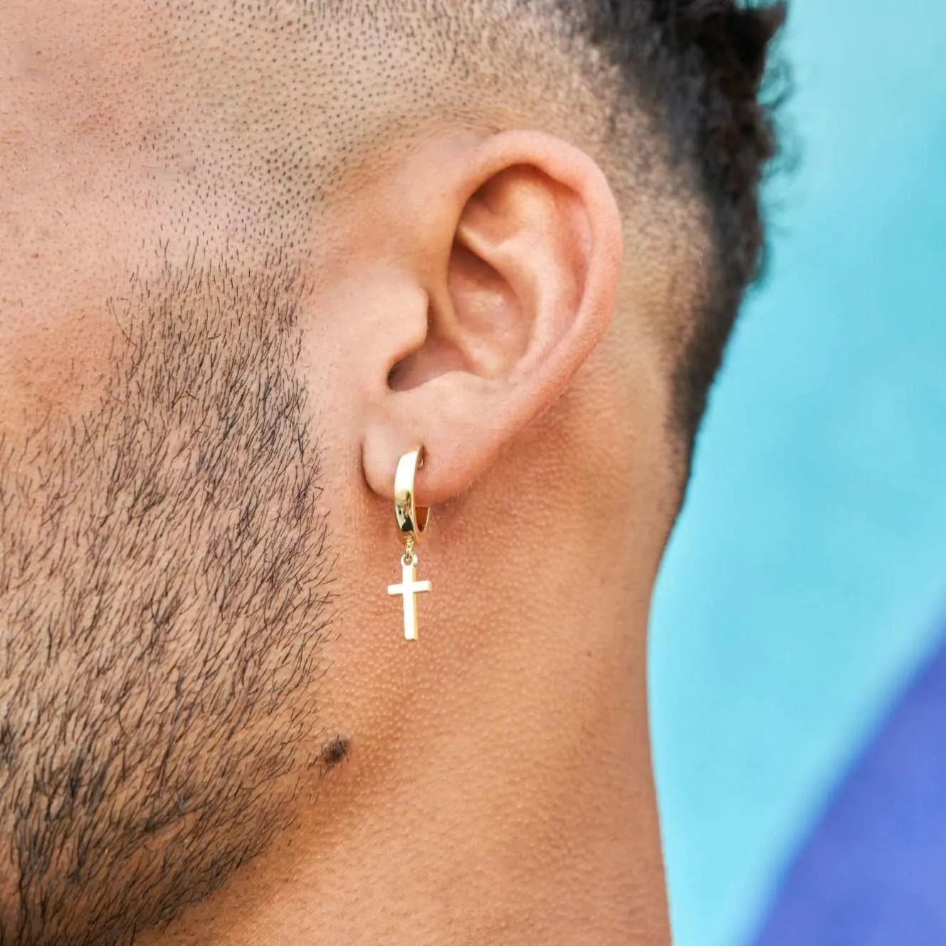 Polished Cross Round Huggie Earrings in Yellow Gold