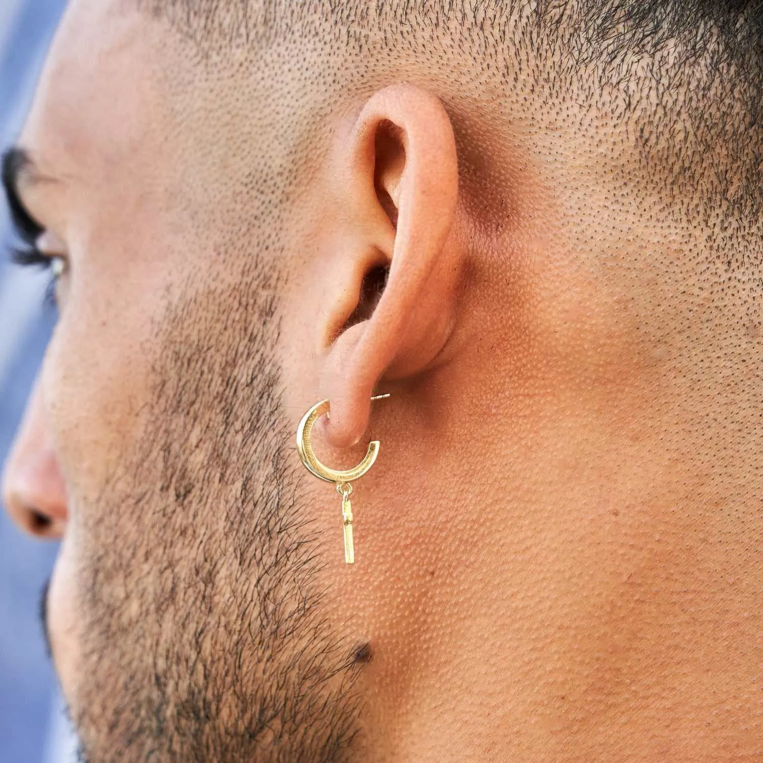 Polished Cross Round Huggie Earrings in Yellow Gold